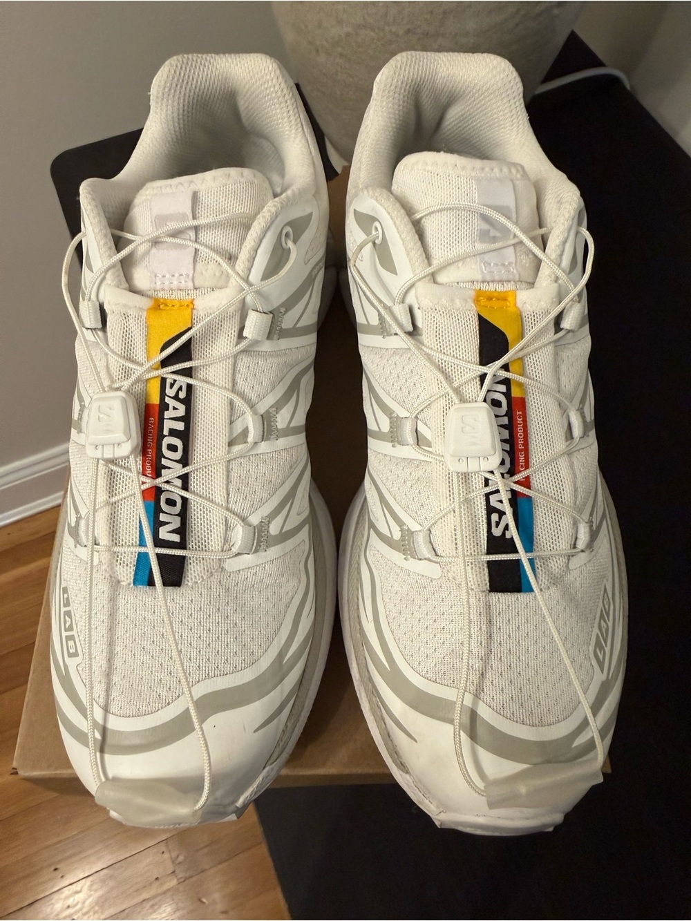 Salomon White Sneakers with Yellow and Blue Pull Tabs